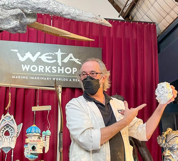Wētā Workshop artist demonstrating prop creation techniques.