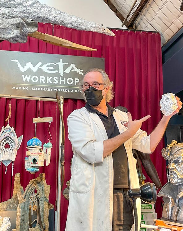 Wētā Workshop artist demonstrating prop creation techniques.