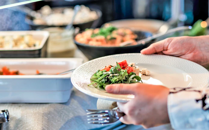 Plate of salad served on Helsinki private champagne cruise.