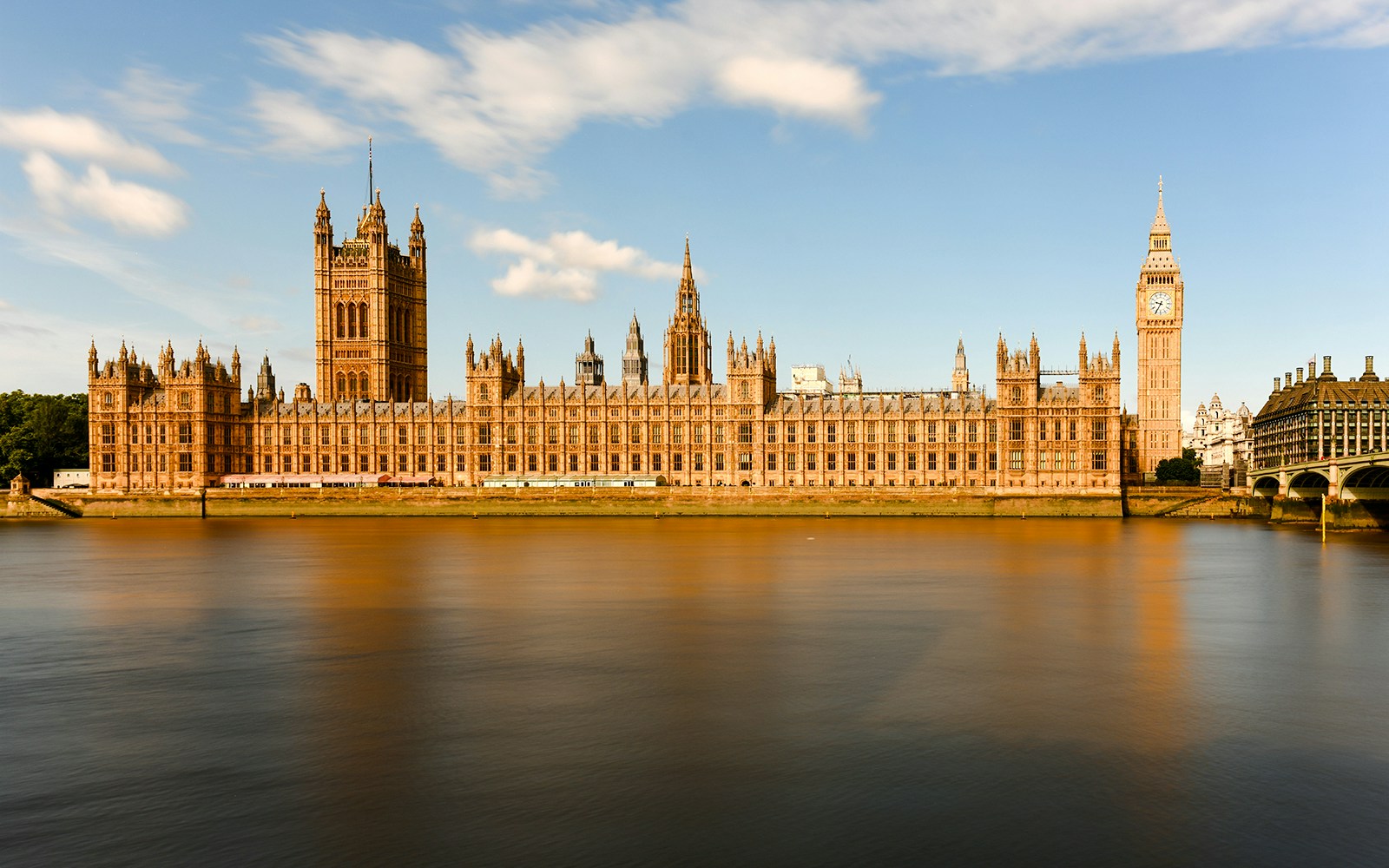 Big Ben and Houses of Parliament along the River Thames, London, UK.