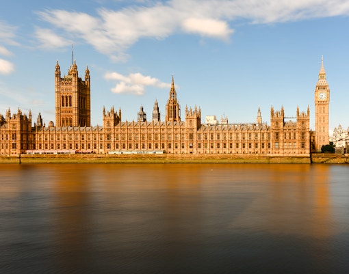 Big Ben and Houses of Parliament along the River Thames, London, UK.