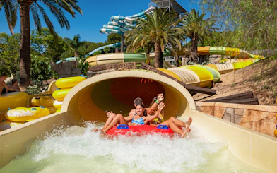 Visitors enjoying the Tukakame water slide at Aqualand Torremolinos.