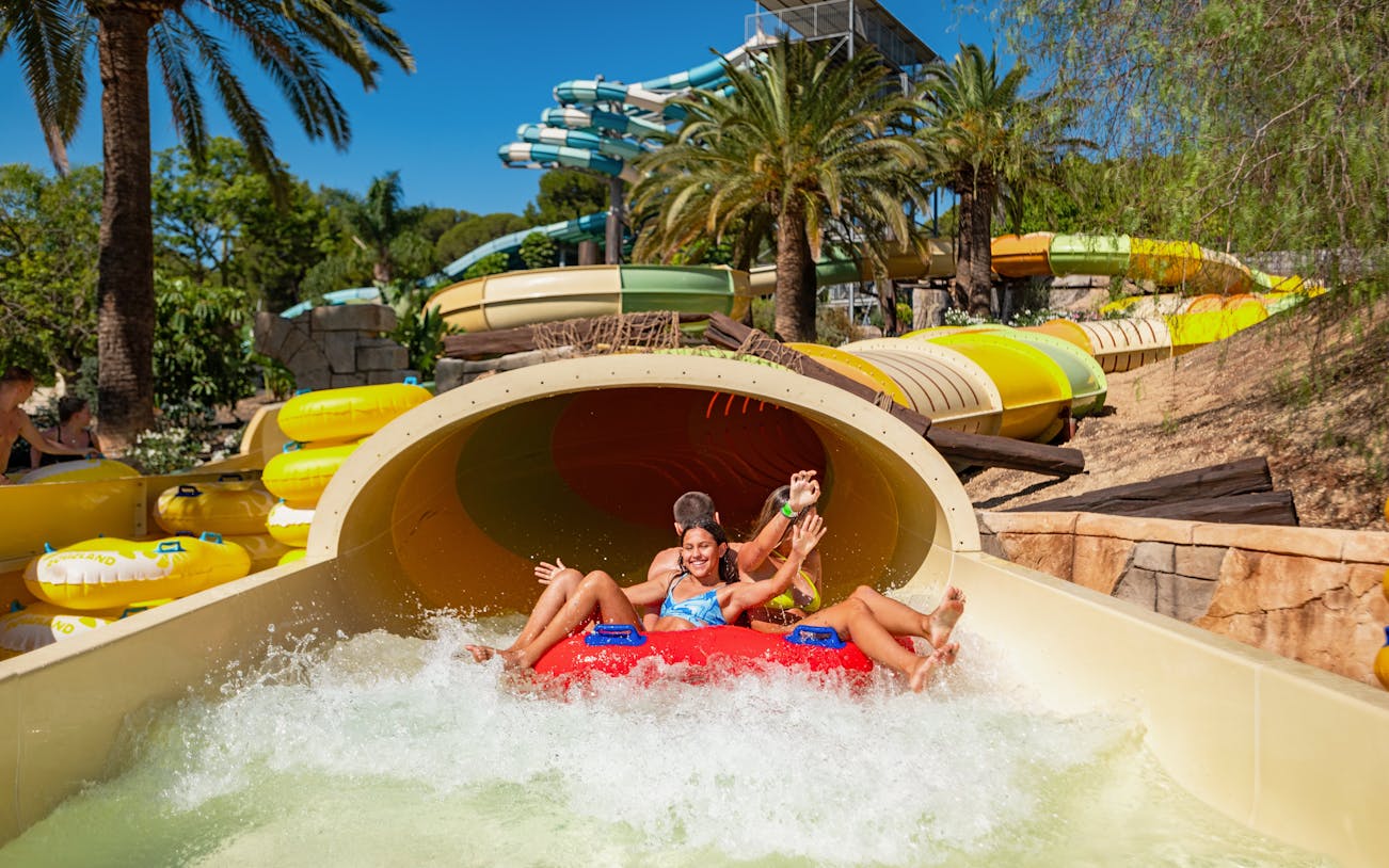 Visitors enjoying the Tukakame water slide at Aqualand Torremolinos.