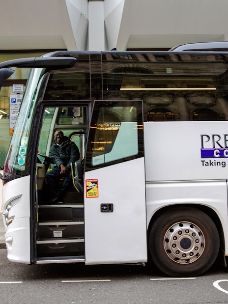 Coach parked on Tothill Street, London, for Stonehenge Day Trip.