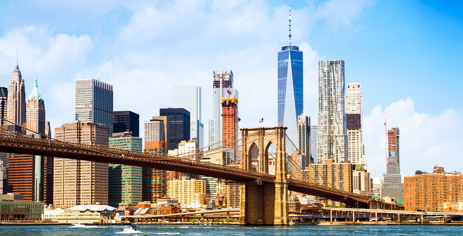 Lower Manhattan skyline with Brooklyn Bridge, New York City.