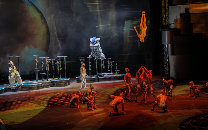 Acrobats performing a banquine flip at La Perle show in Dubai.