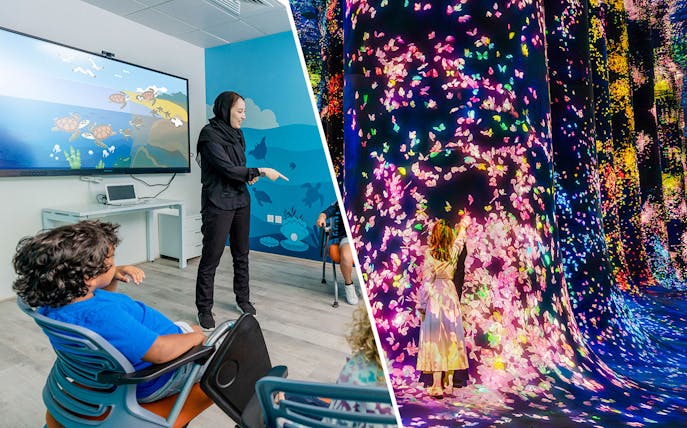 Interactive art installation at Team Lab Abu Dhabi with children engaging in digital displays.