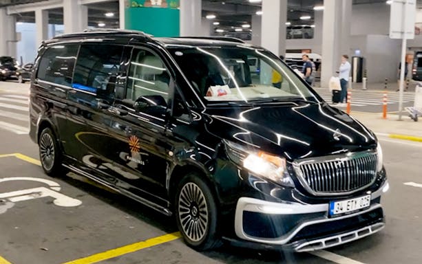 Black van for private transfer at Sabiha Gokcen Airport, Istanbul.