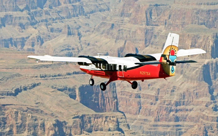 Airplane flying over the Grand Canyon West Rim.