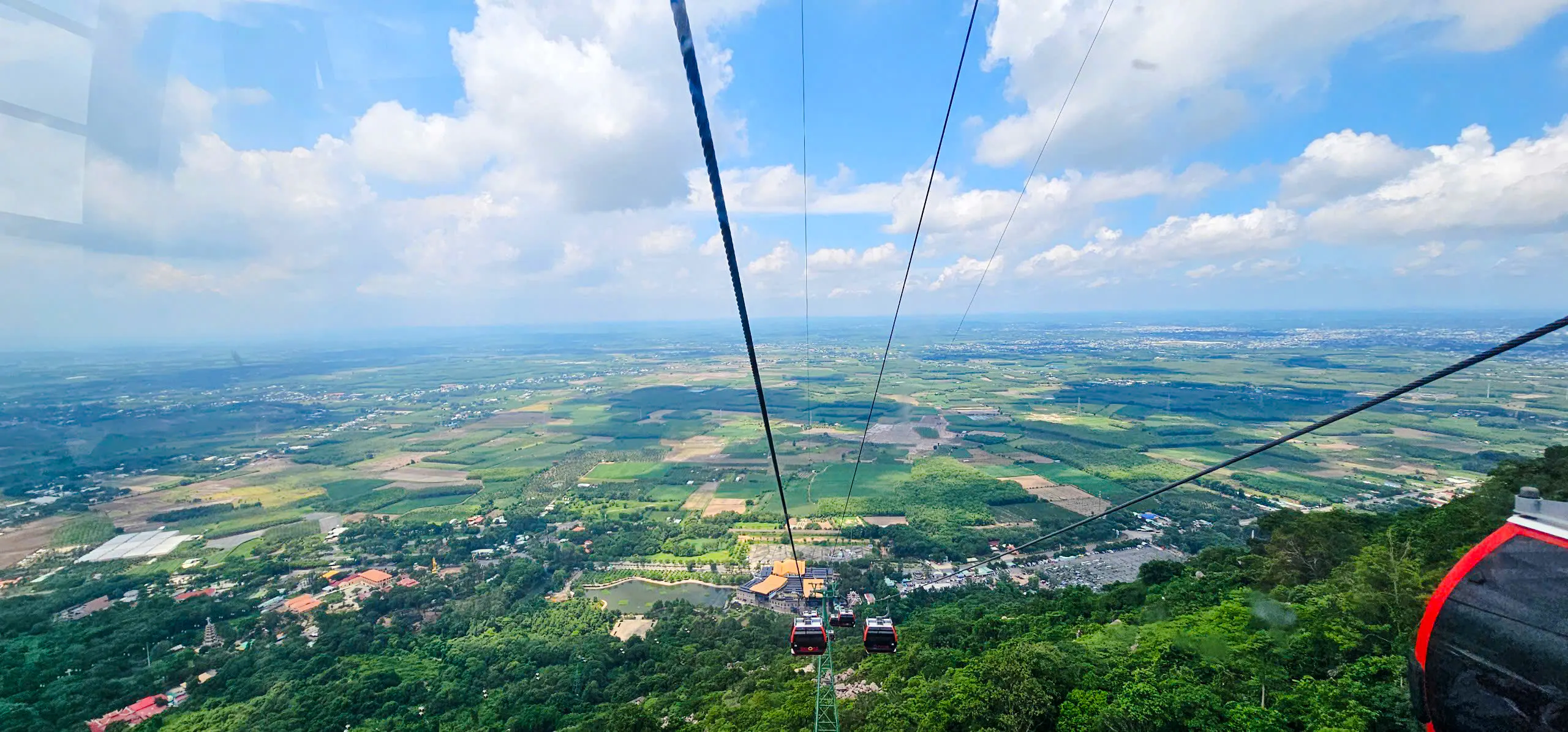 Cable car view over lush landscape near Black Virgin Mountain, Ho Chi Minh City.