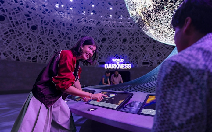 Interactive display at Biopool in Exploria, Mandai Wildlife, with visitors engaging in activities.