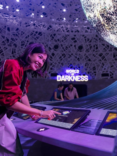 Interactive display at Biopool in Exploria, Mandai Wildlife, with visitors engaging in activities.