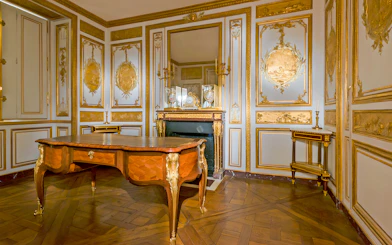 Versailles King's Private Apartment, Royal Ledger Room with ornate gold detailing.