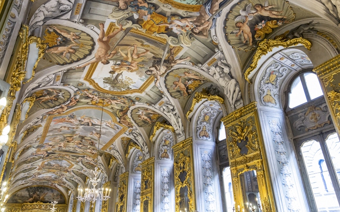 Doria Pamphilj Gallery ceiling frescoes with intricate gold detailing and classical figures.