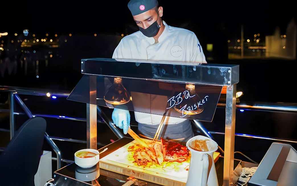Barbecue station on 2-hour luxury dhow dinner cruise in Dubai.