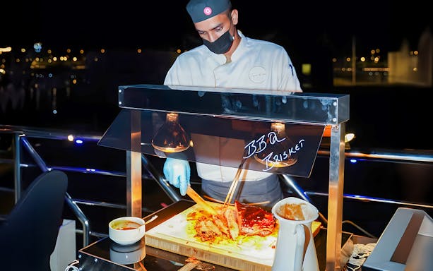 Barbecue station on 2-hour luxury dhow dinner cruise in Dubai.