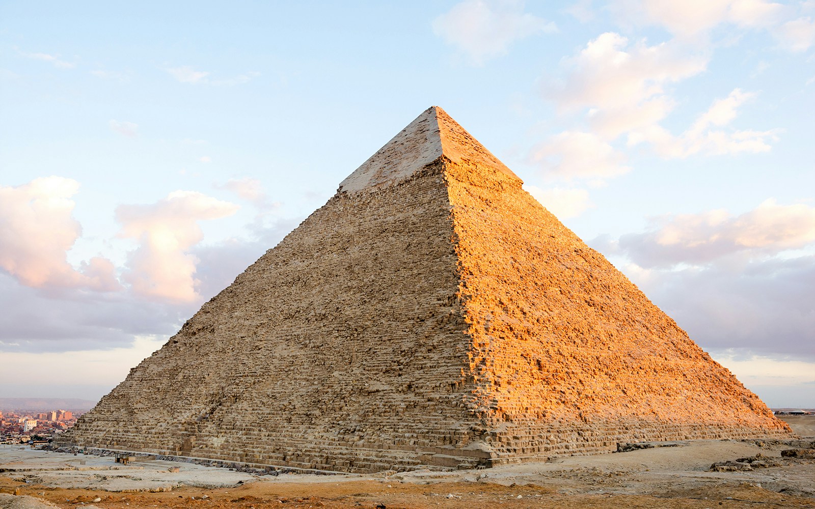 Pyramid of Khafre in Giza, Egypt, under a clear sky.