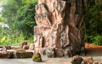 Long Ya Men rock formation surrounded by lush greenery in Singapore.