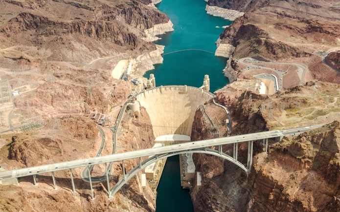 Aerial view of Hoover Dam and Colorado River Bridge, Nevada, Arizona, USA.