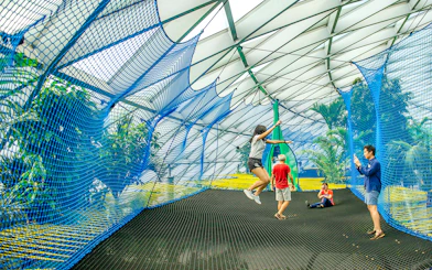 Visitors enjoying the Bouncing Net at Canopy Park, Jewel Changi.