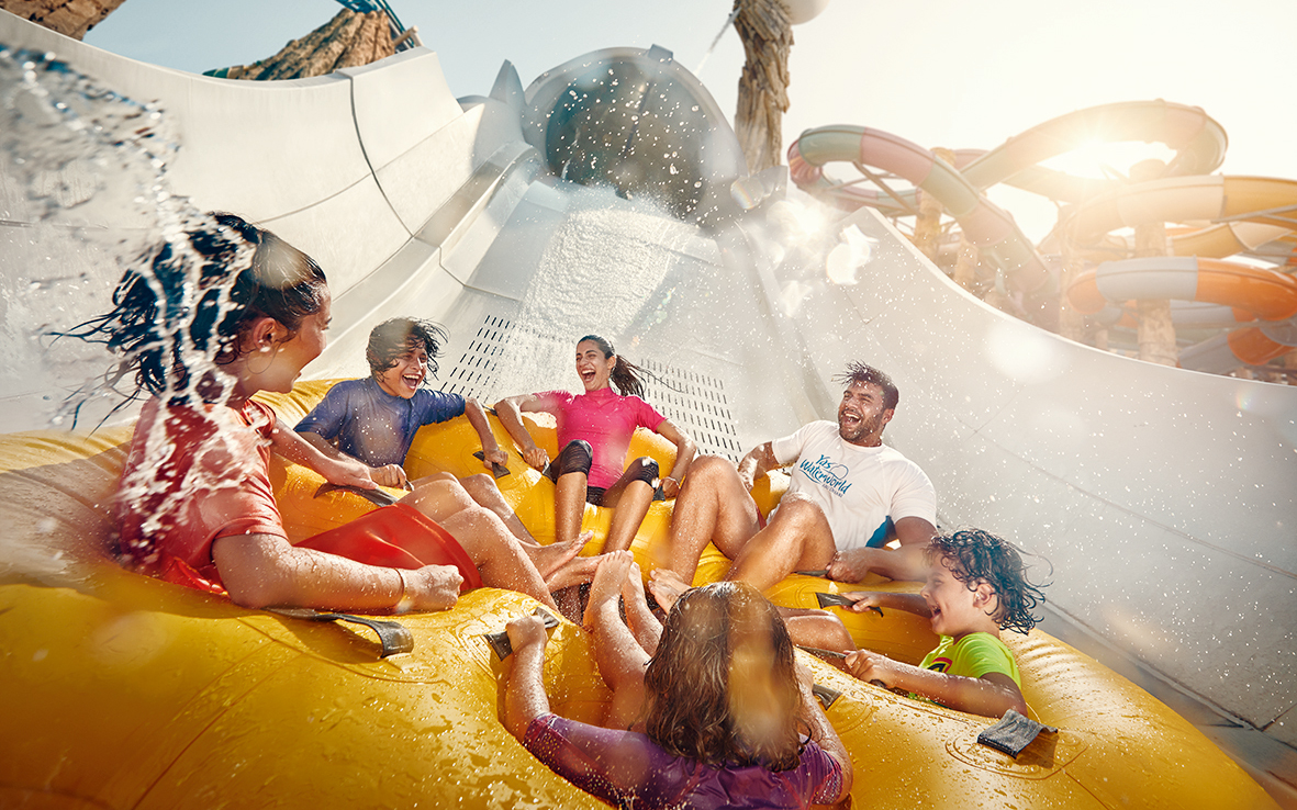 People enjoying Falcons Falaj water ride at YAS Waterworld, Abu Dhabi.