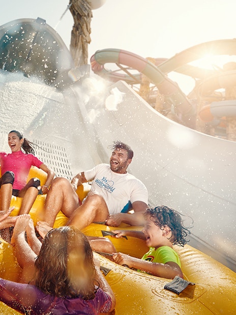People enjoying Falcons Falaj water ride at YAS Waterworld, Abu Dhabi.