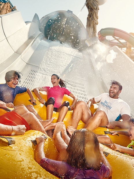 People enjoying Falcons Falaj water ride at YAS Waterworld, Abu Dhabi.