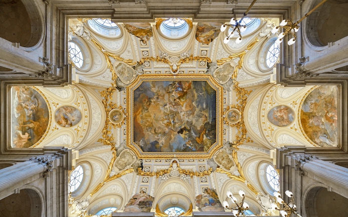 Ceiling fresco in the Royal Palace of Madrid depicting mythological scenes.