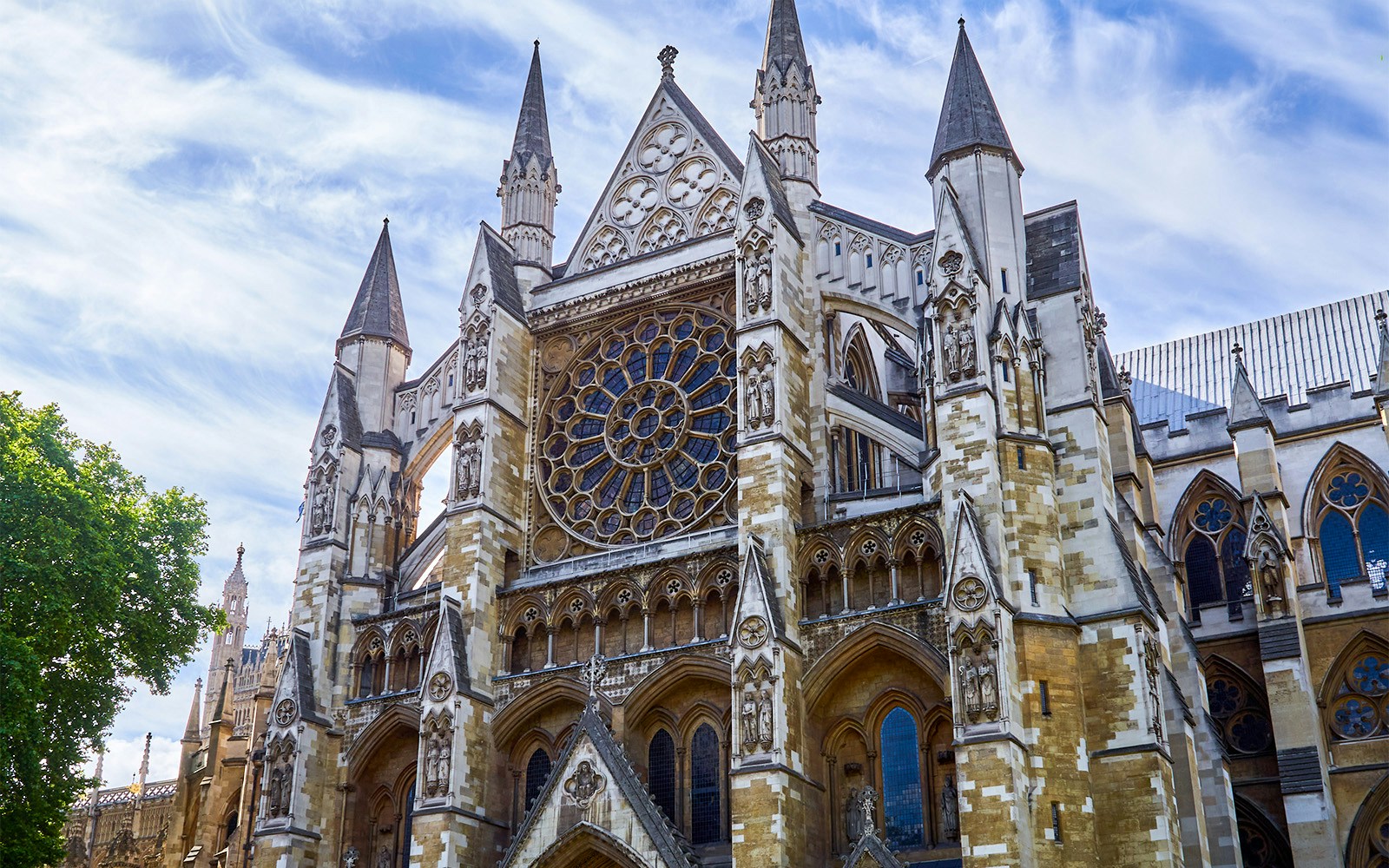Westminster Abbey facade with intricate Gothic architecture in London.