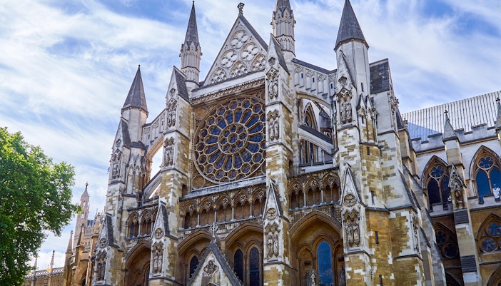 Westminster Abbey facade with intricate Gothic architecture in London.