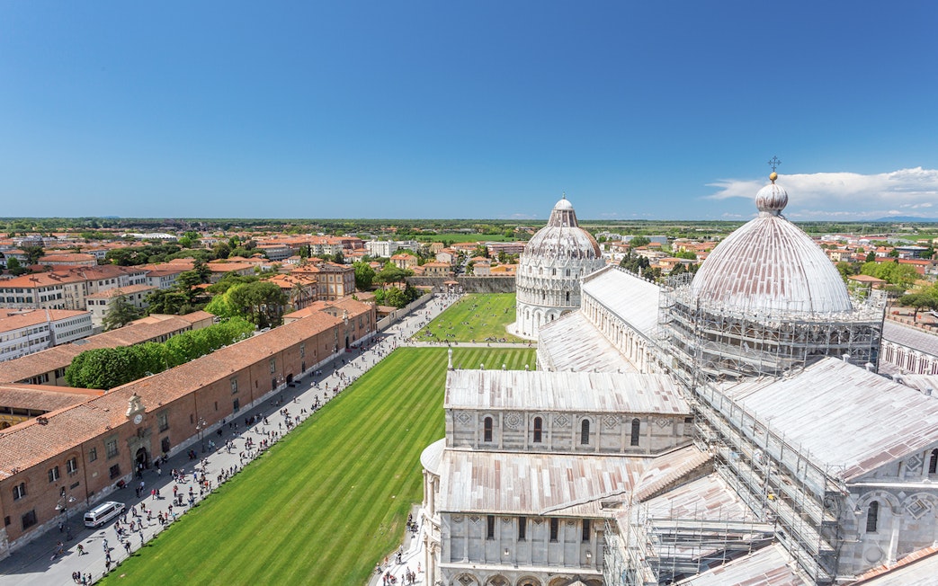 Panoramic view of Pisa Cathedral and surrounding cityscape from Leaning Tower.