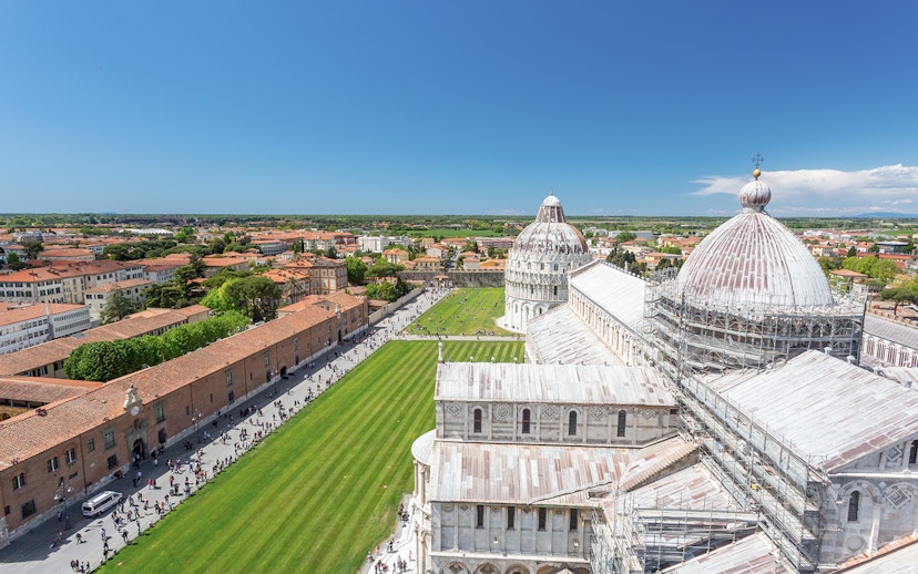 Panoramic view of Pisa Cathedral and surrounding cityscape from Leaning Tower.