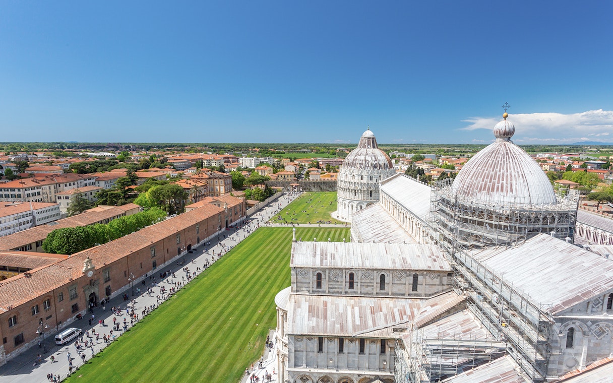 Panoramic view of Pisa Cathedral and surrounding cityscape from Leaning Tower.