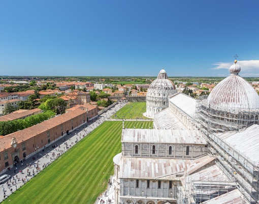 Panoramic view of Pisa Cathedral and surrounding cityscape from Leaning Tower.