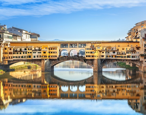 Ponte Vecchio spanning the Arno River in Florence, Italy.