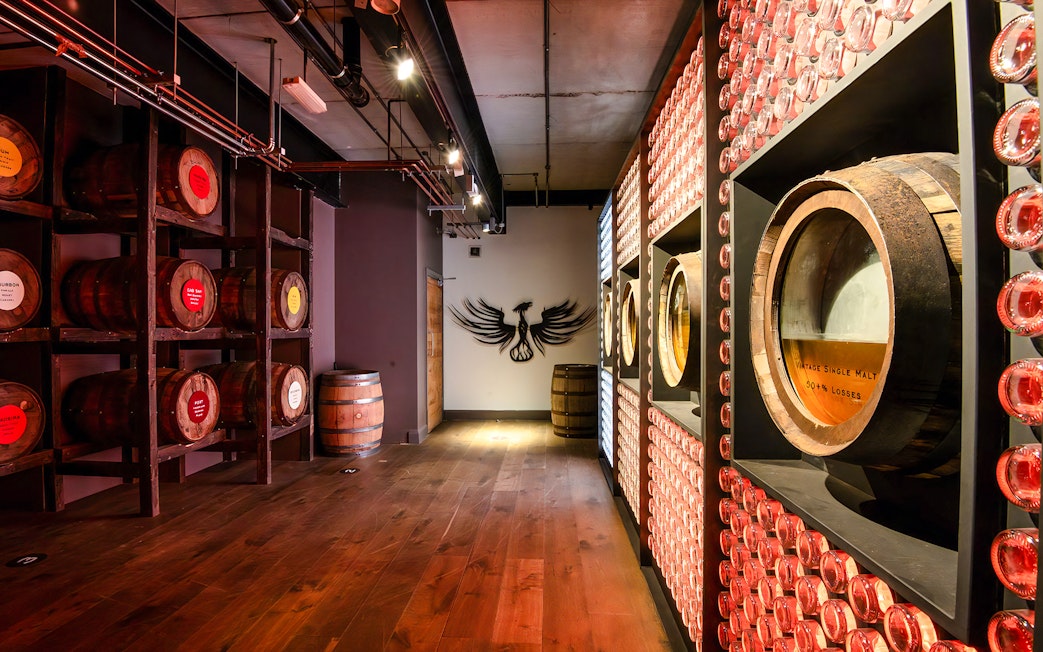 Barrels and wall display inside Teeling Whiskey Distillery, Dublin.