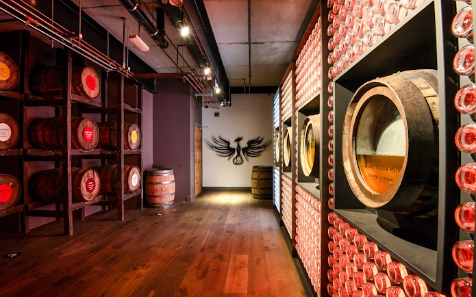 Barrels and wall display inside Teeling Whiskey Distillery, Dublin.