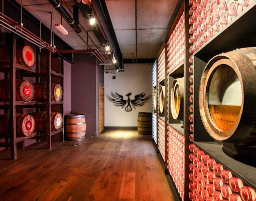 Barrels and wall display inside Teeling Whiskey Distillery, Dublin.