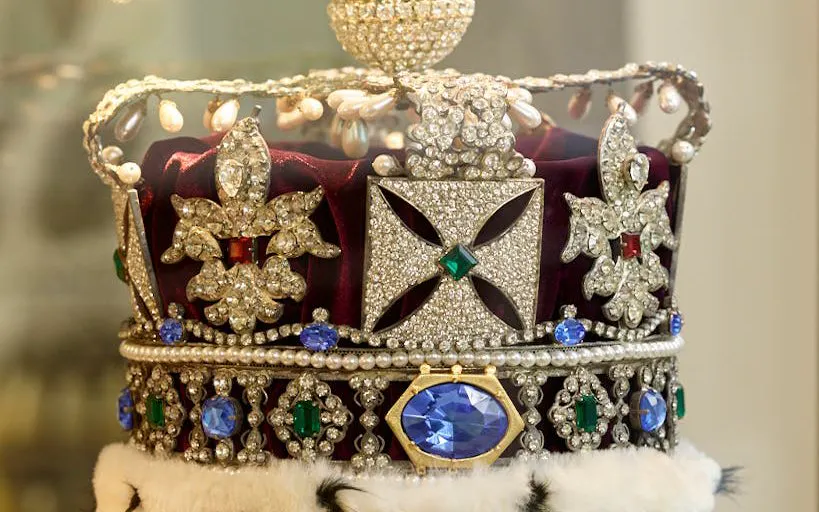 Crown adorned with diamonds and gemstones at Stichting Diamant Museum Amsterdam.
