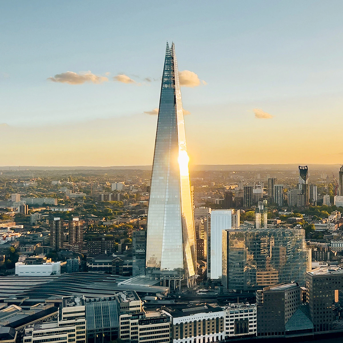 Aerial view of the Shard tower in central London at sunset.