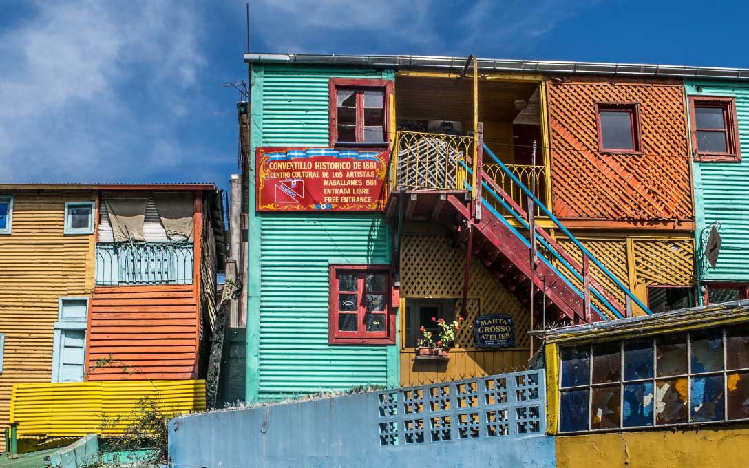 Colorful buildings and balcony in La Boca, Buenos Aires walking tour.