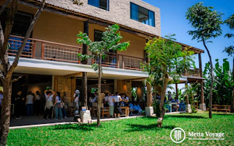 Visitors at a traditional wood carving workshop in Driftwood Village, Hoi An.