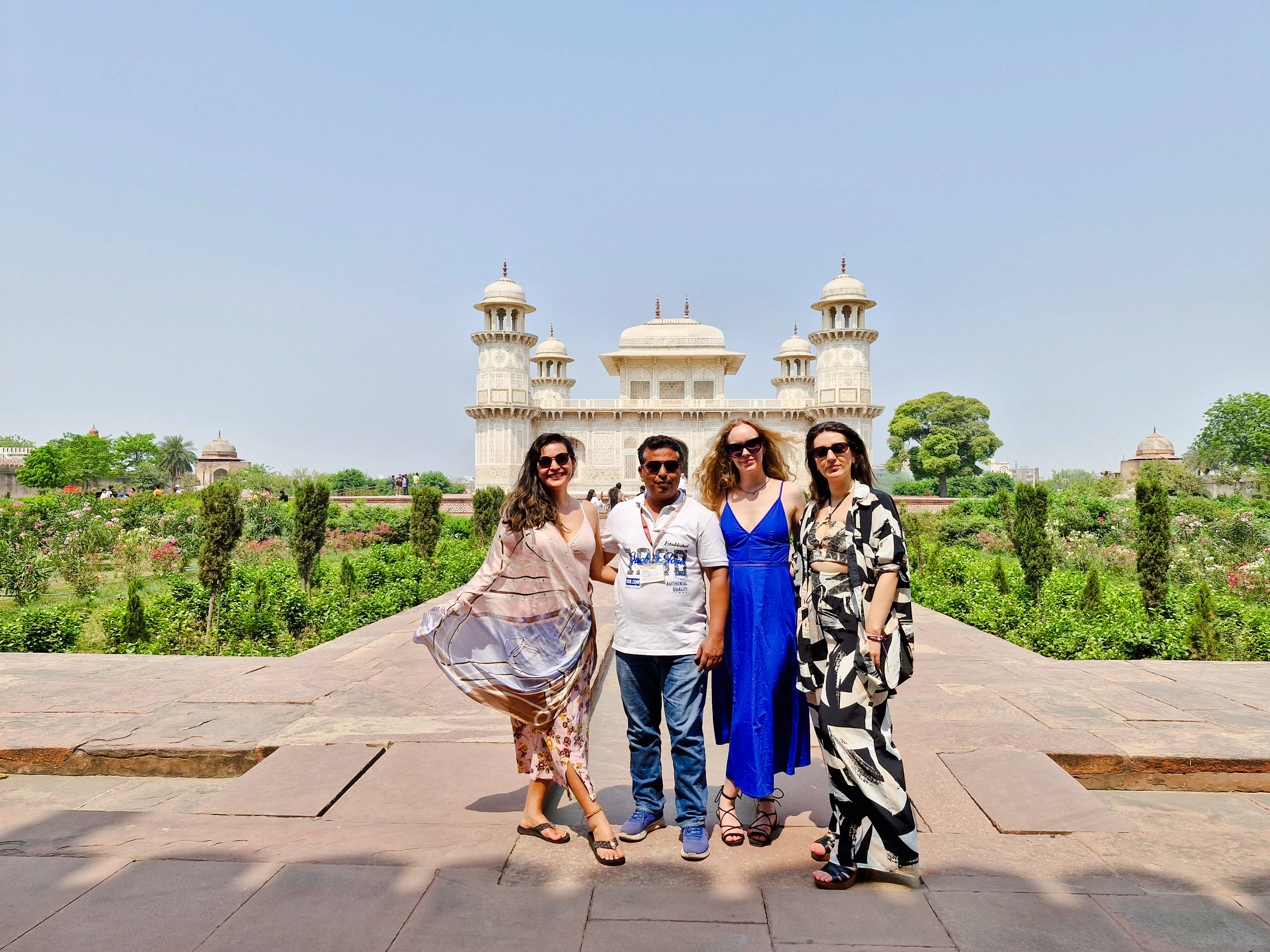Tourists in front of Itimad-ud-Daulah's Tomb, Agra, during a guided day tour from Delhi.