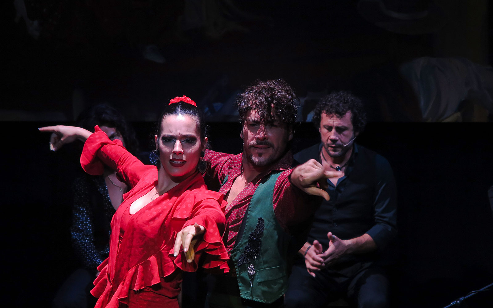 Flamenco dancers performing at Triana Theater in Seville.