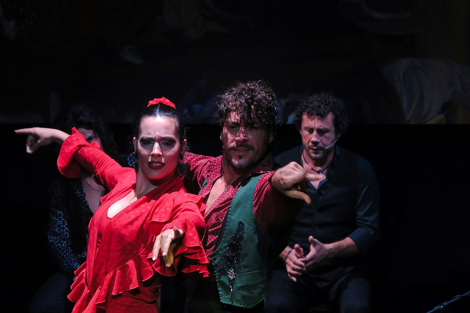 Flamenco dancers performing at Triana Theater in Seville.