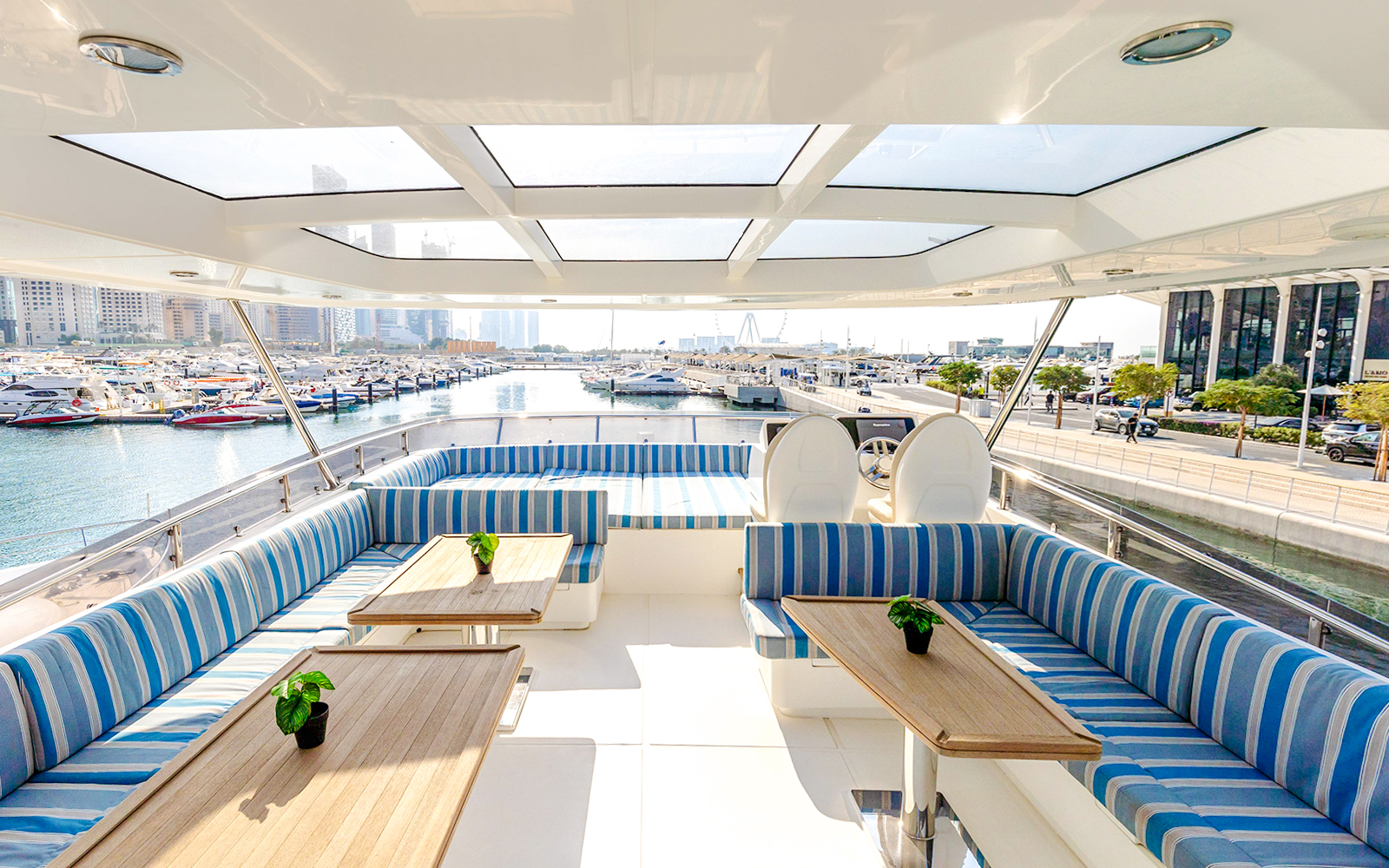 Dubai marina view from luxury yacht deck during sunset tour.