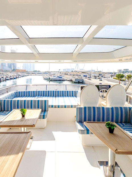Dubai marina view from luxury yacht deck during sunset tour.