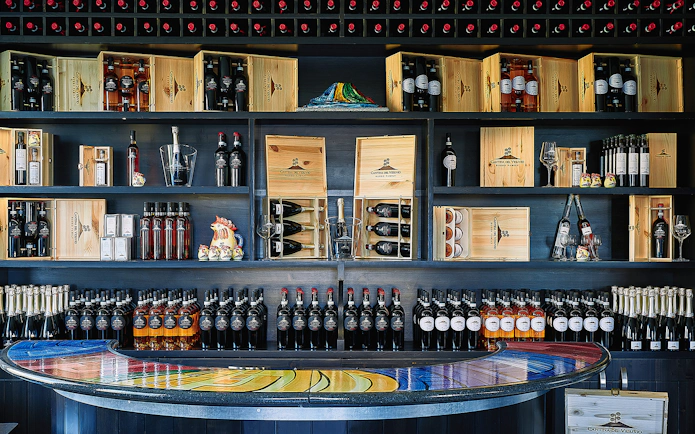 Wine bottles displayed at Cantina del Vesuvio, Naples, for wine tasting tour.