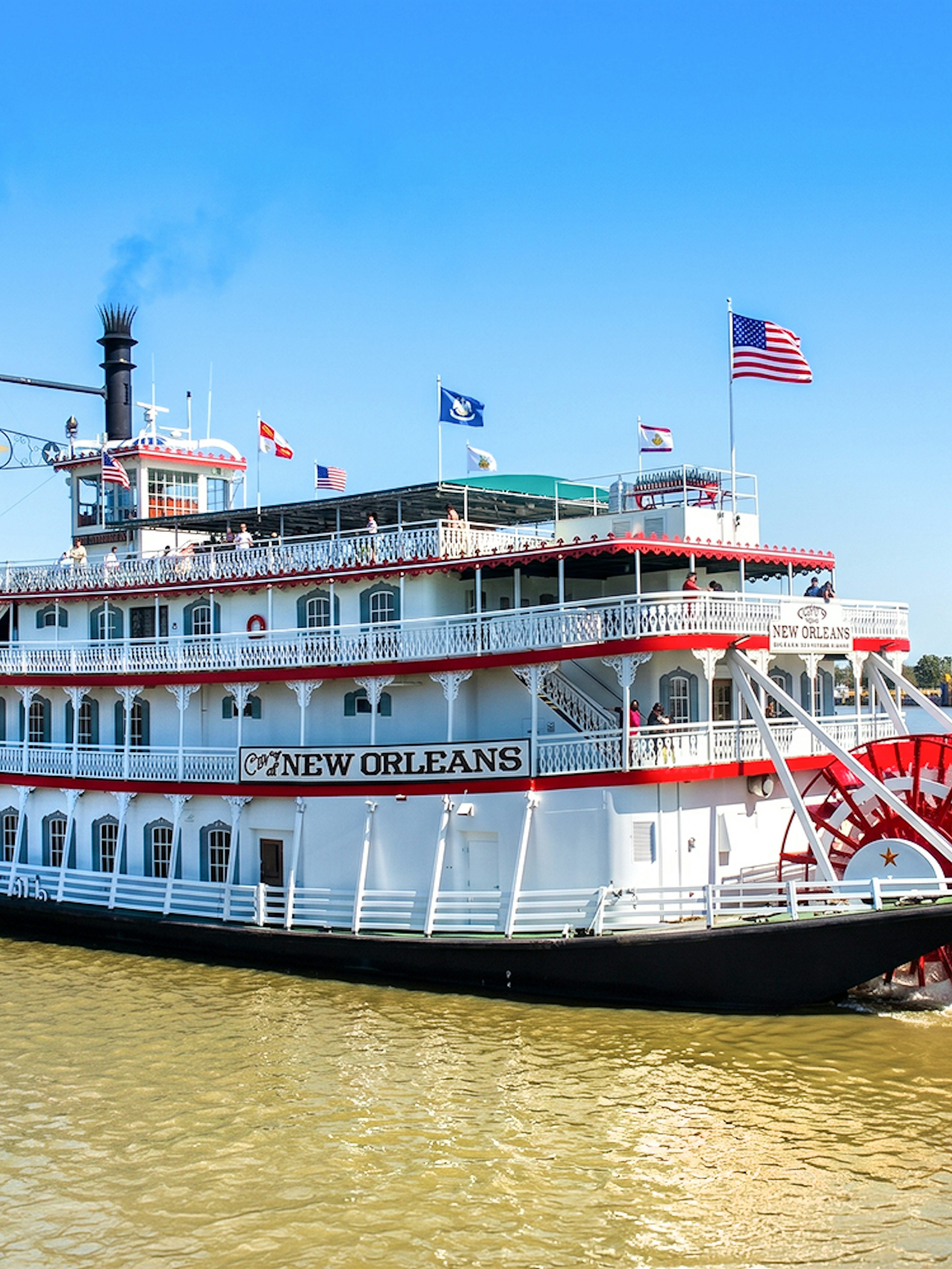 Riverboat cruising on the Mississippi River in New Orleans.