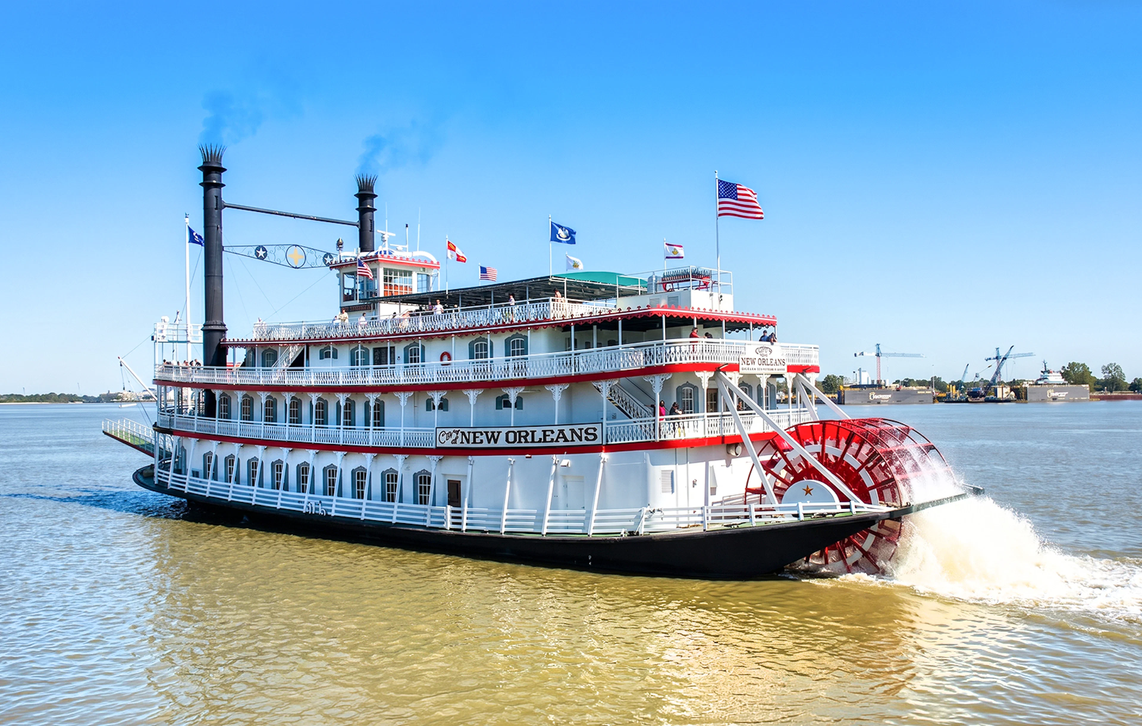 Riverboat cruising on the Mississippi River in New Orleans.
